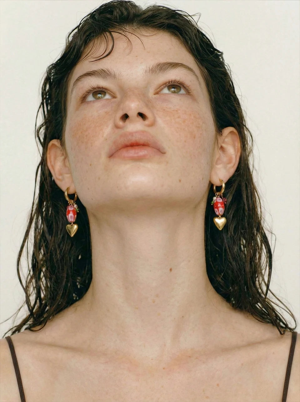 Red heart earrings in gold-plated stainless steel.