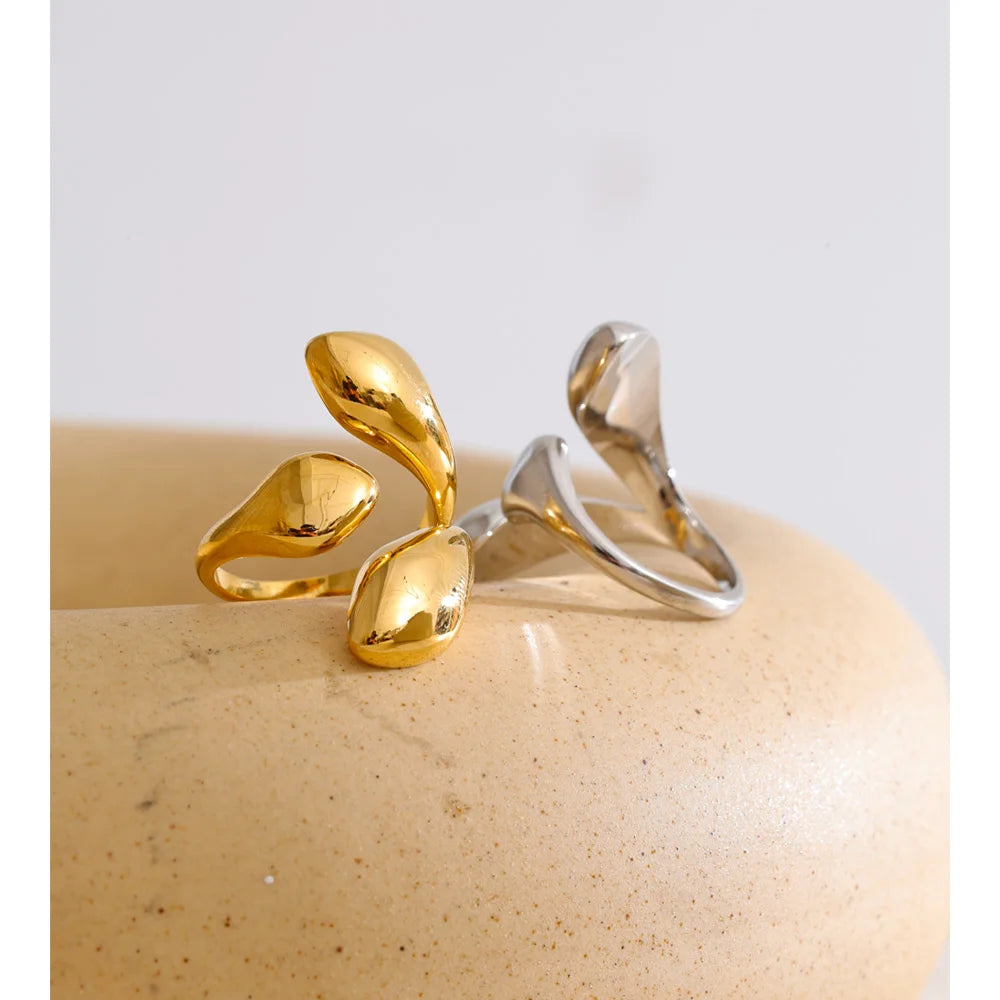Geometric ring in gold-plated stainless steel.