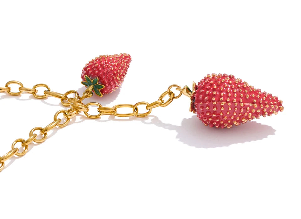 Red heart geometric necklace in gold-plated stainless steel.