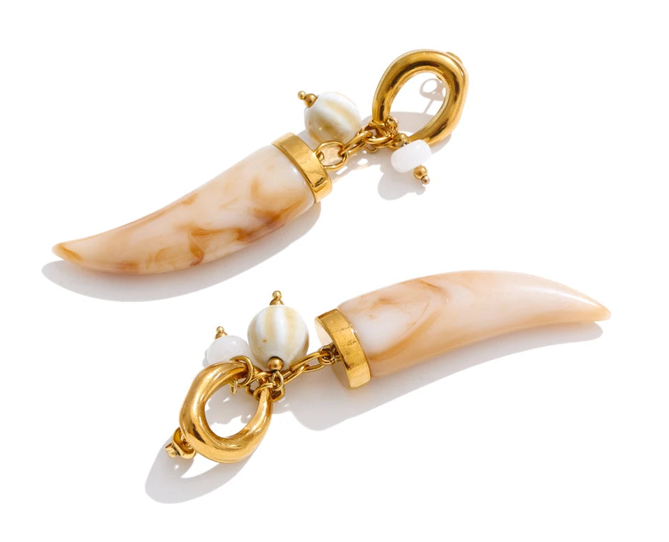Resin acrylic geometric earrings in gold-plated stainless steel with resin and acrylic.