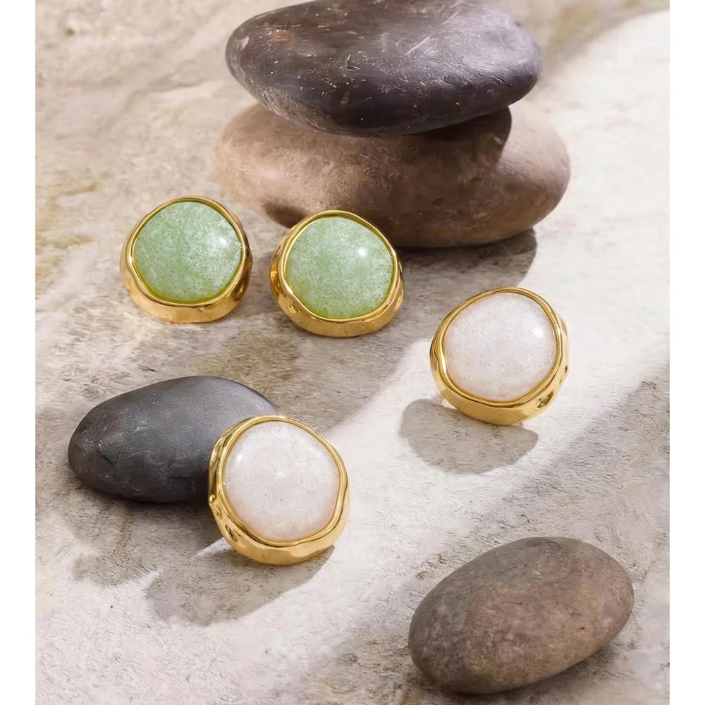 White resin acrylic earrings in gold-plated stainless steel with resin and acrylic.