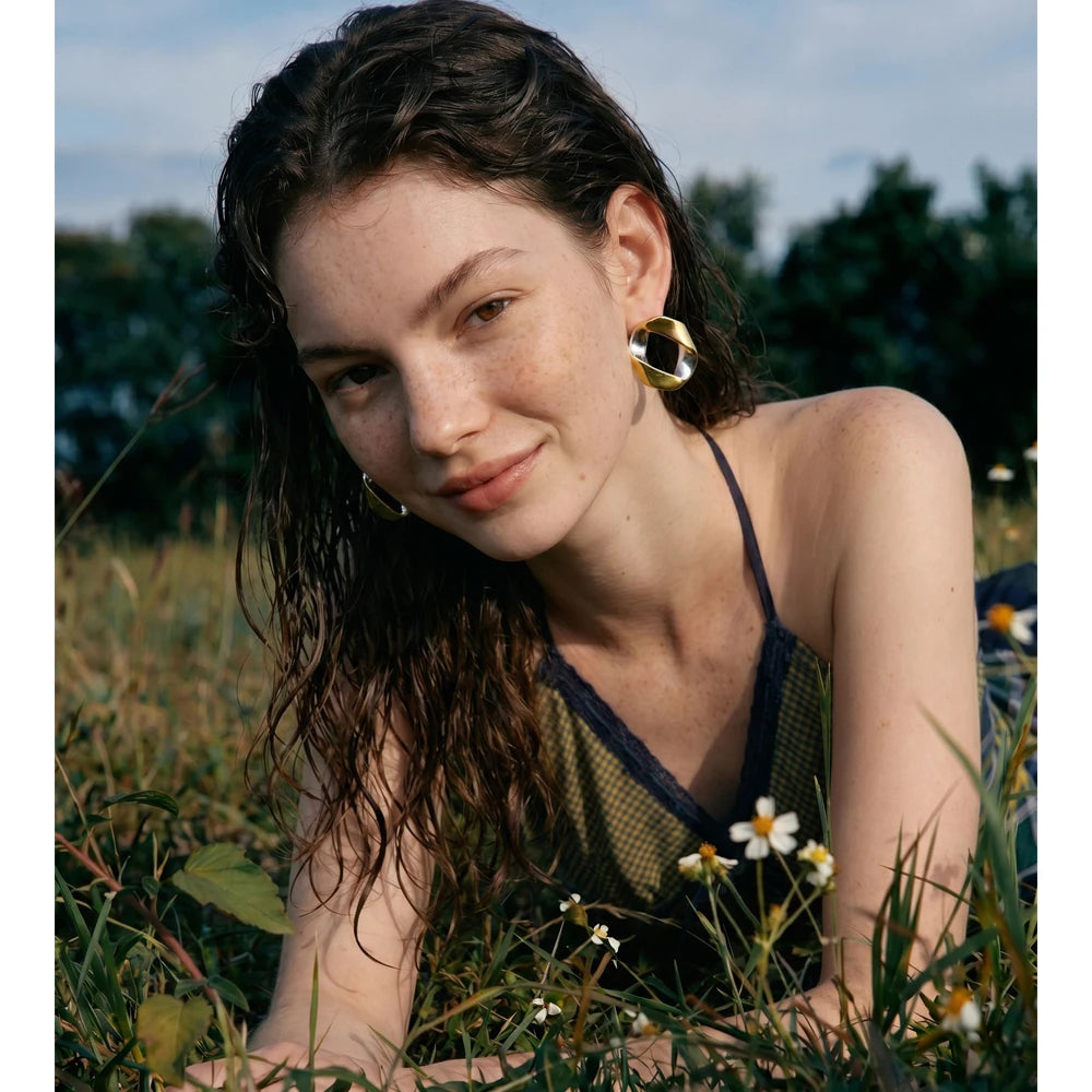 Geometric earrings in gold-plated stainless steel.