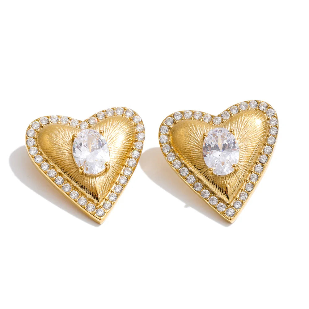 Cubic zirconia heart earrings in gold-plated stainless steel with cubic zirconia.