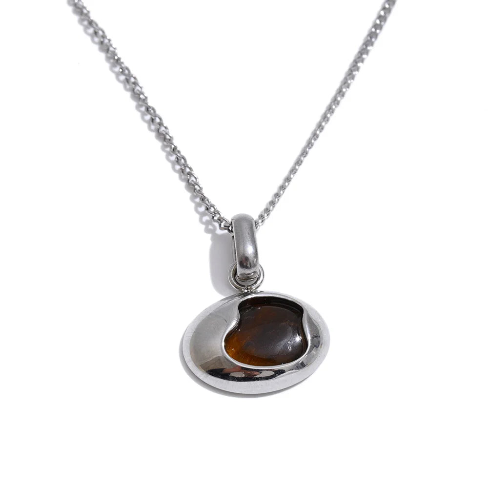 Natural stone geometric necklace in gold-plated stainless steel with natural stone.