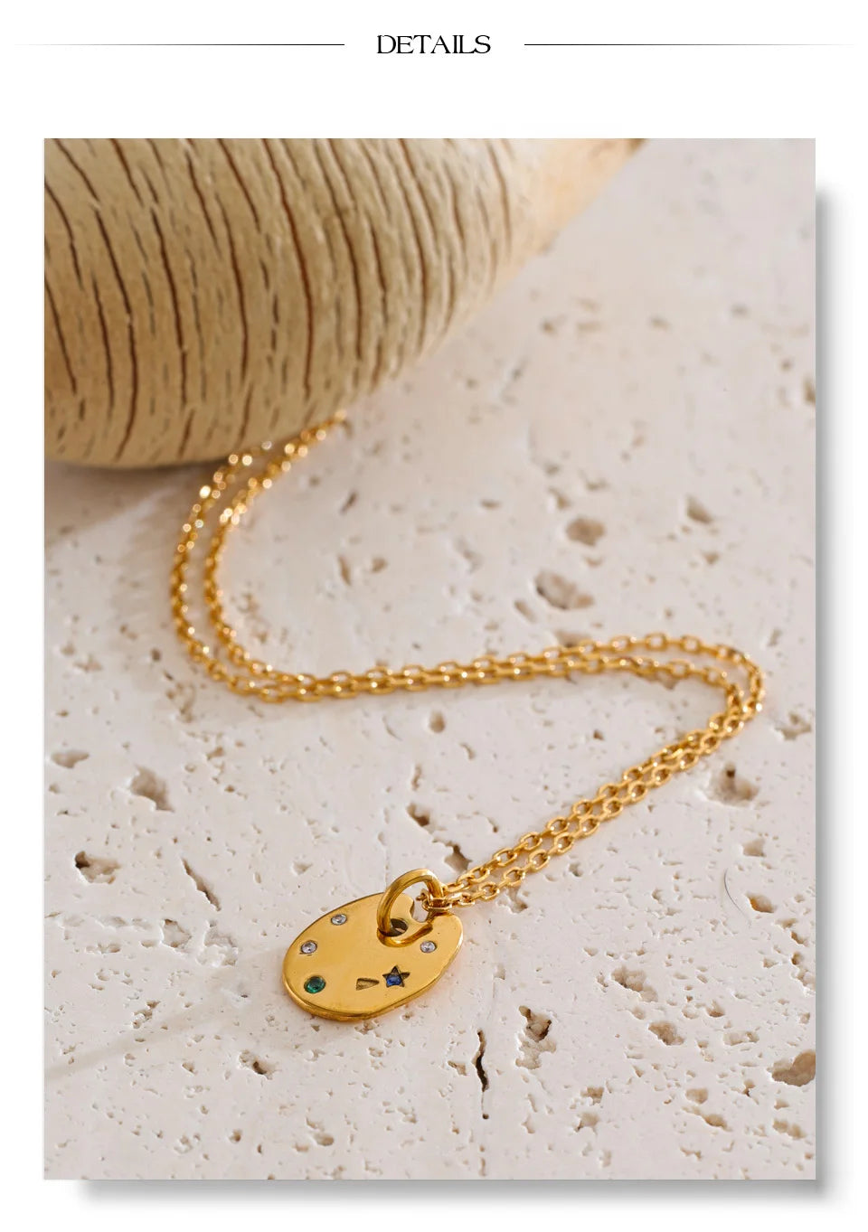 Cubic zirconia multi-color geometric necklace in gold-plated stainless steel with cubic zirconia.