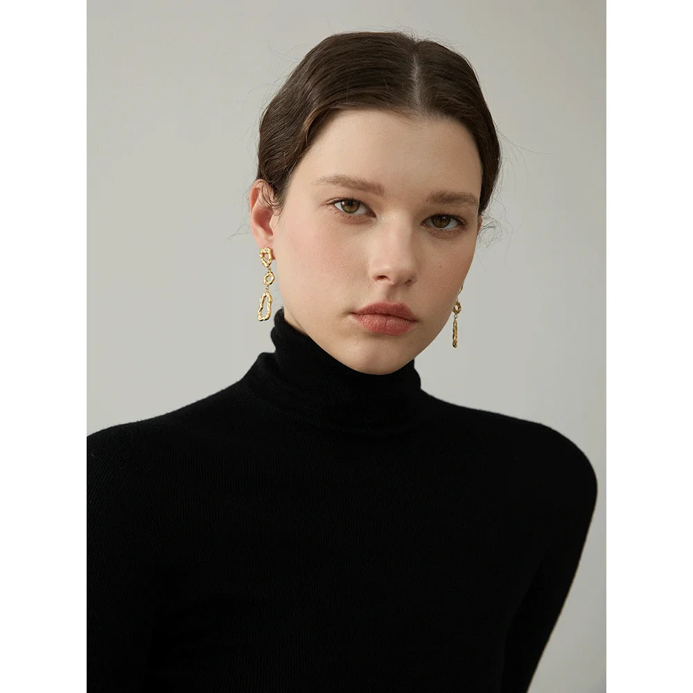 Geometric earrings in gold-plated 316L stainless steel.