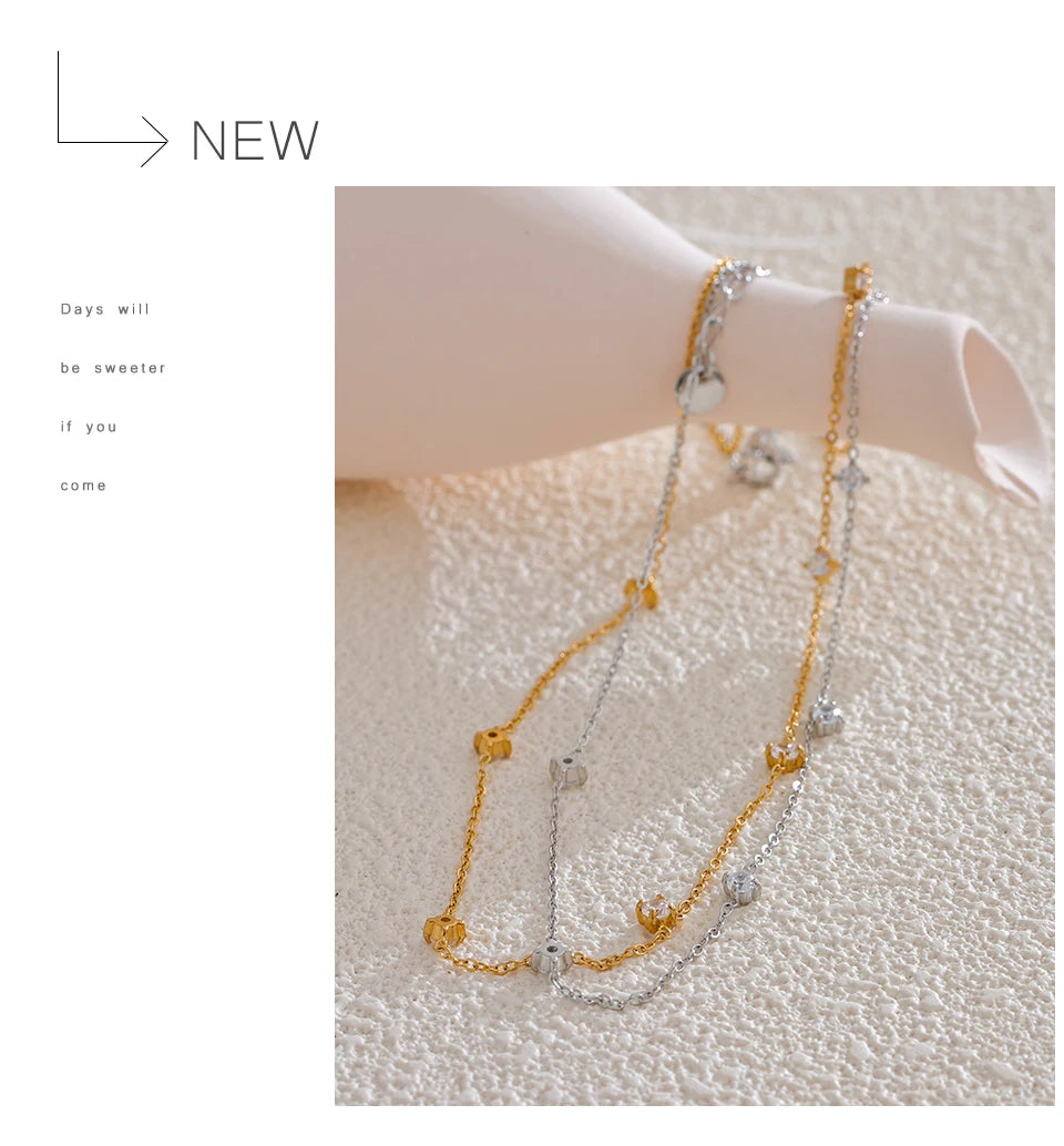 Cubic zirconia geometric necklace in gold-plated stainless steel with cubic zirconia.