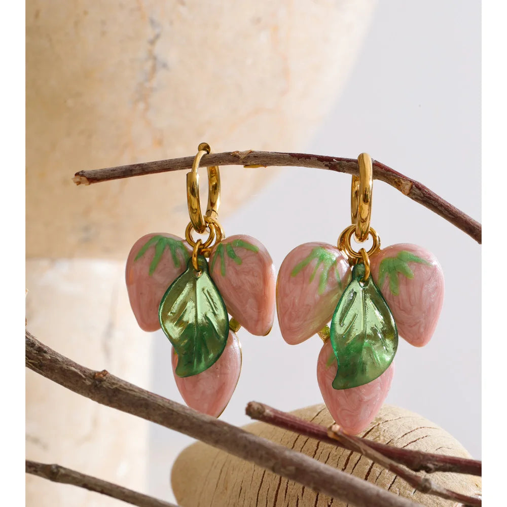 White geometric earrings in gold-plated stainless steel.