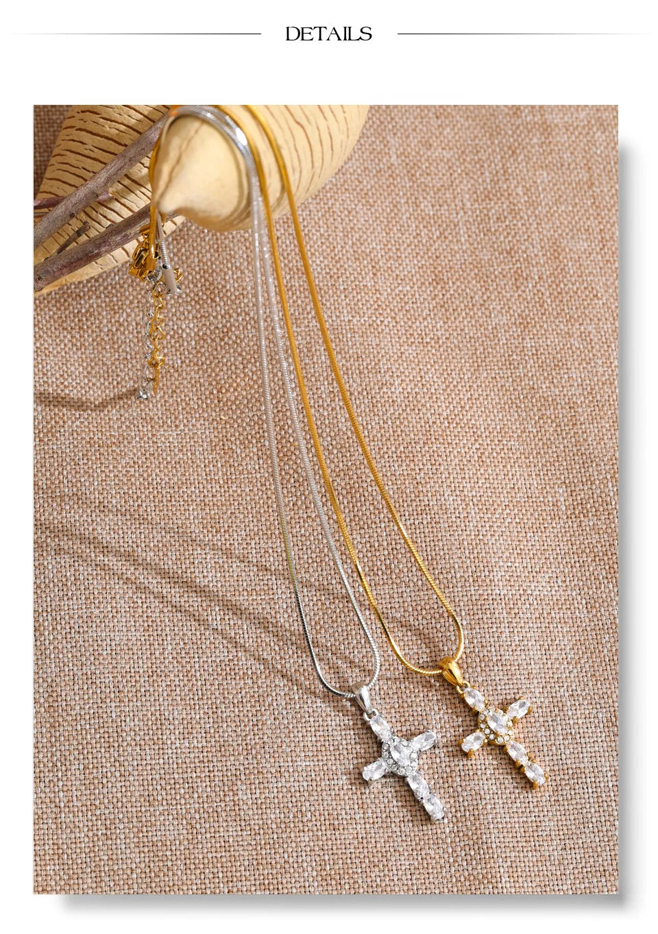 Cubic zirconia cross necklace in gold-plated stainless steel with cubic zirconia.