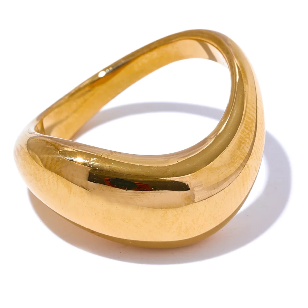 Gold-plated stainless steel ring with a large oval shape.