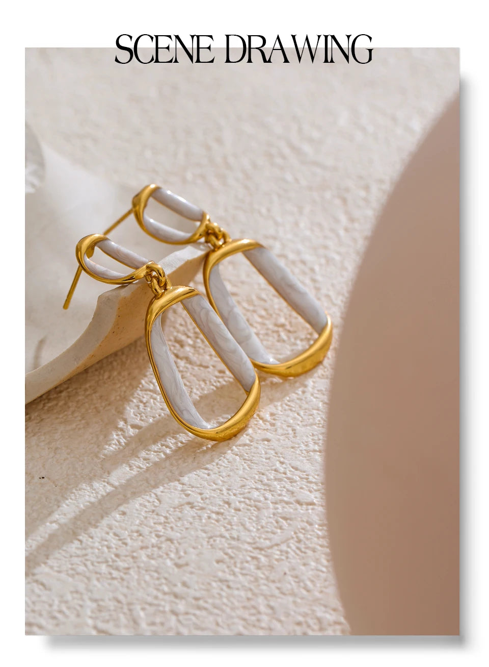 White enamel geometric earrings in gold-plated stainless steel with enamel.