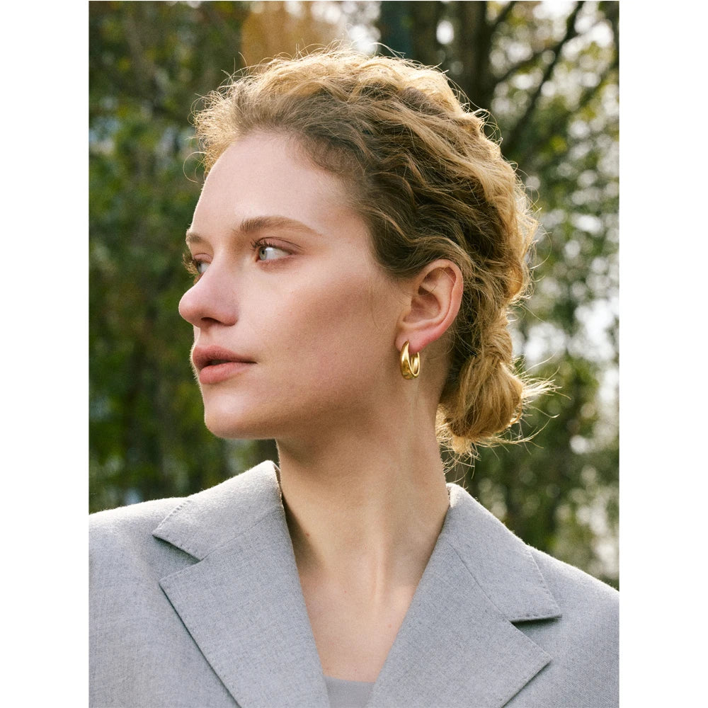 Geometric earrings in gold-plated 316L stainless steel.