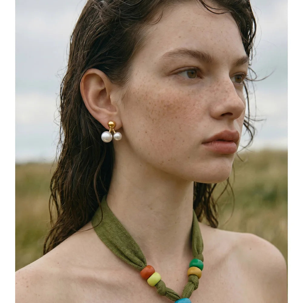 Pearl geometric earrings in gold-plated stainless steel with pearl.