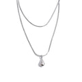 Geometric chain necklace in gold-plated stainless steel.