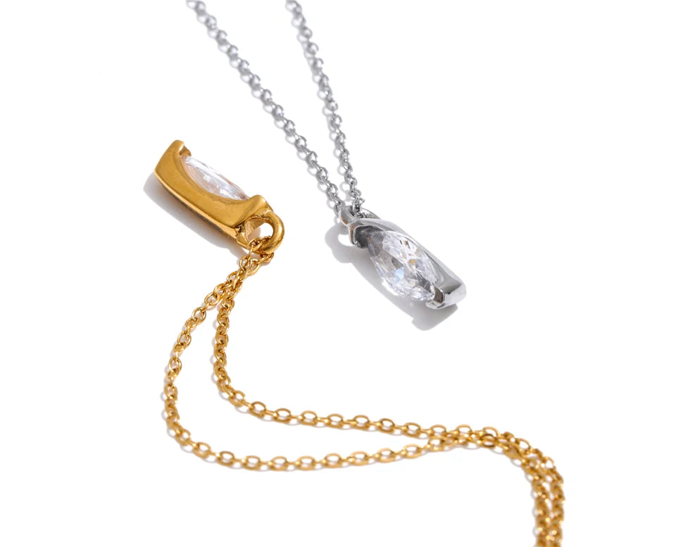 Cubic zirconia geometric necklace in gold-plated stainless steel with cubic zirconia.