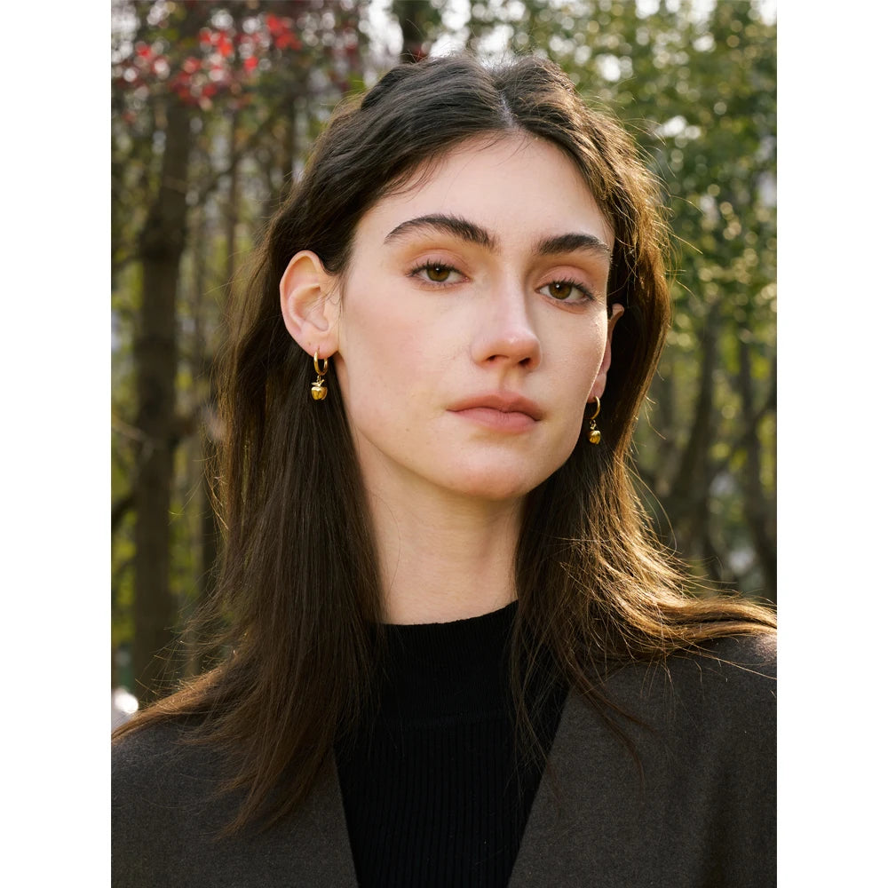 Geometric earrings in gold-plated stainless steel.