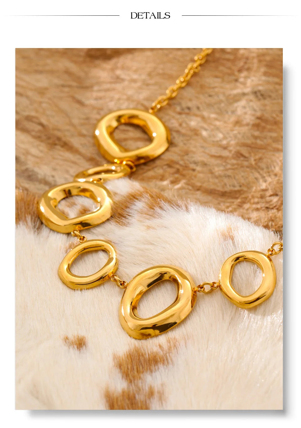 Cubic zirconia geometric chain necklace in gold-plated stainless steel with cubic zirconia.