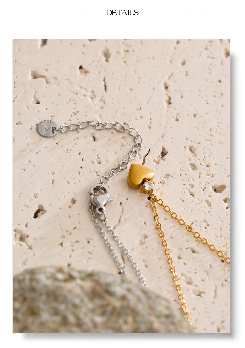 Cubic zirconia heart necklace in gold-plated stainless steel with cubic zirconia.