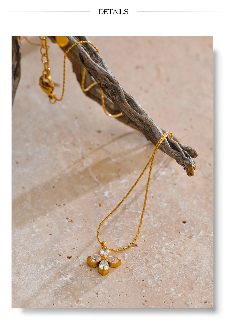 Cubic zirconia flower necklace in gold-plated stainless steel with cubic zirconia.