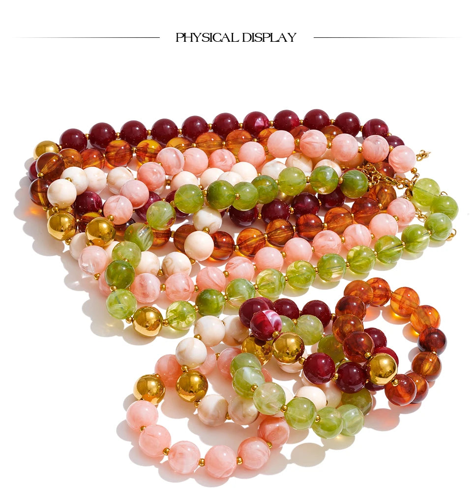 Resin beaded multi-color necklace in gold-plated stainless steel with resin.