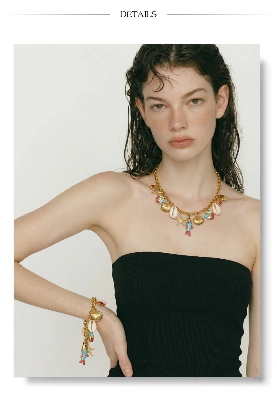 Shell enamel star necklace in gold-plated stainless steel with shell and enamel.