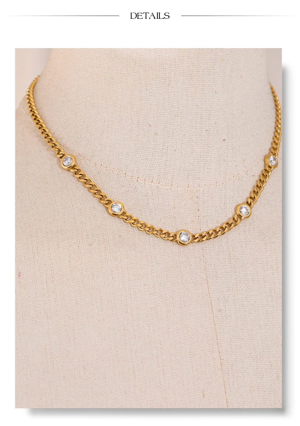 Cubic zirconia geometric chain necklace in gold-plated stainless steel with cubic zirconia.