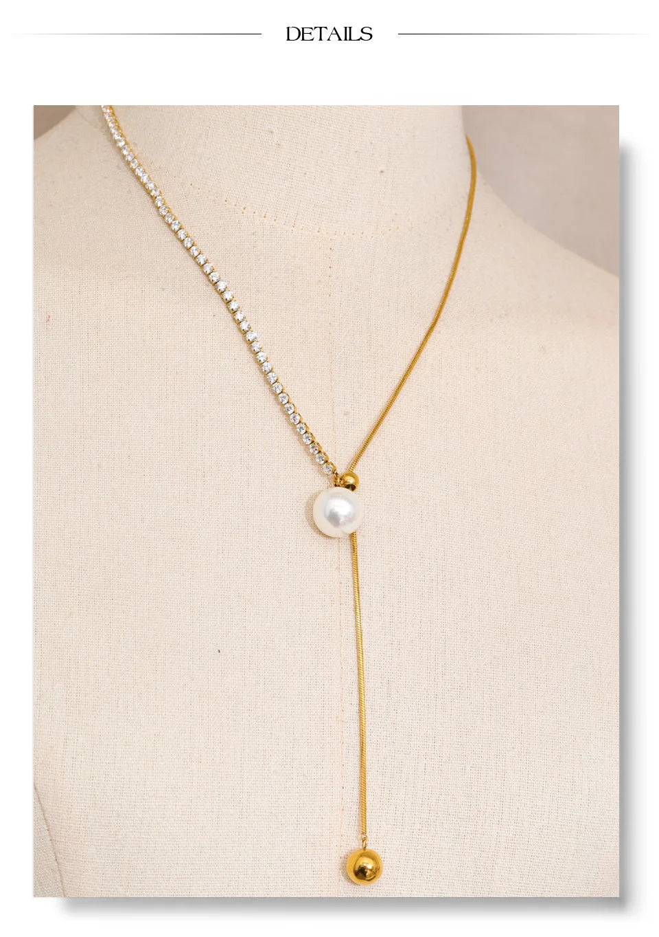 Cubic zirconia pearl geometric necklace in gold-plated stainless steel with pearl and cubic zirconia.