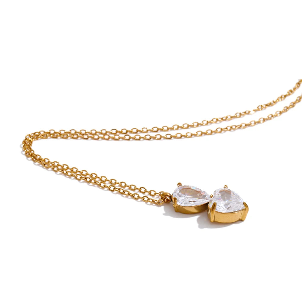 Cubic zirconia geometric necklace in gold-plated stainless steel with cubic zirconia.