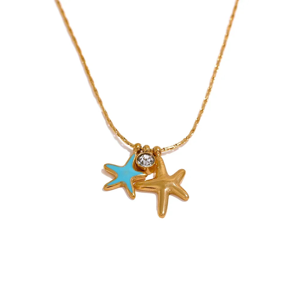 Cubic zirconia star necklace in gold-plated stainless steel with cubic zirconia.