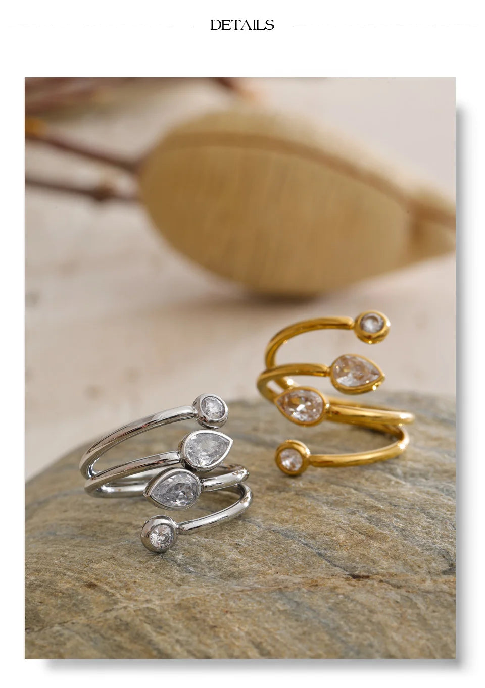 Cubic zirconia geometric layered ring in 18K gold-plated stainless steel with cubic zirconia.