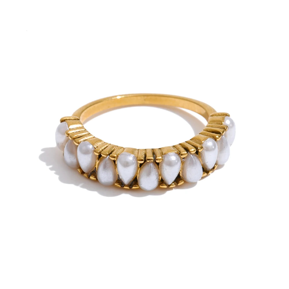 Pearl geometric ring in 18K gold-plated stainless steel with pearl.