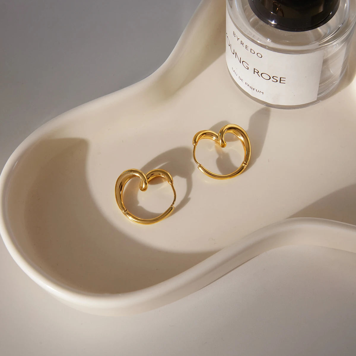 Twisted Heart Hoop Earrings — Stainless Steel · PS067