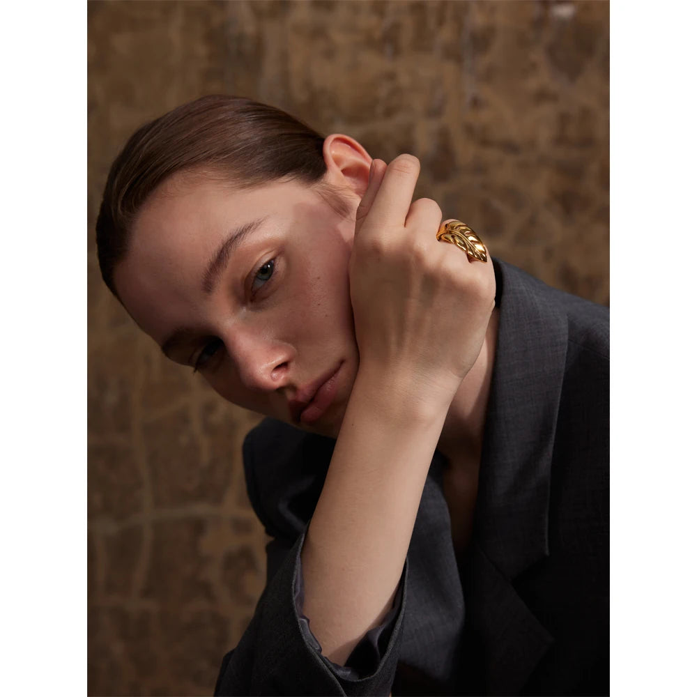 Geometric ring in 18K gold-plated stainless steel.