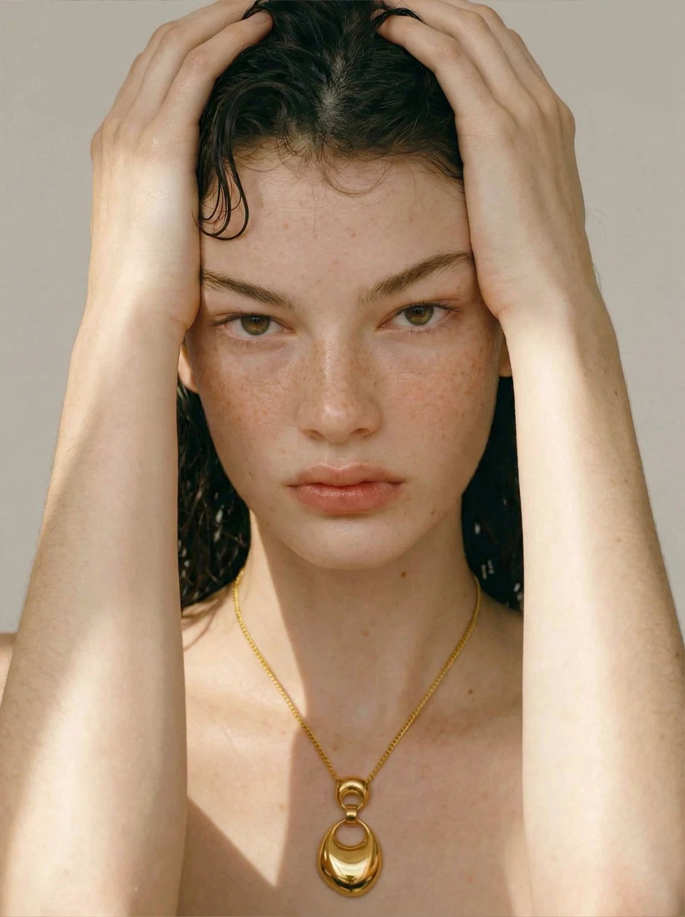 Geometric necklace in gold-plated stainless steel.