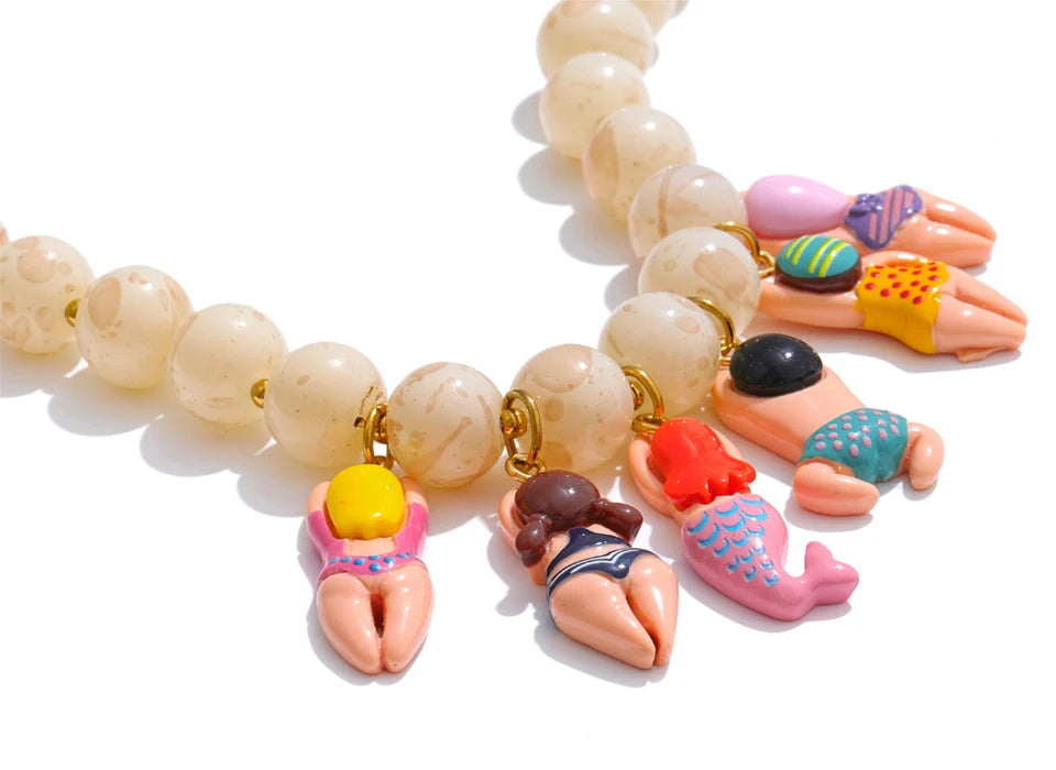 Resin glass natural stone necklace in gold-plated stainless steel with natural stone and resin.