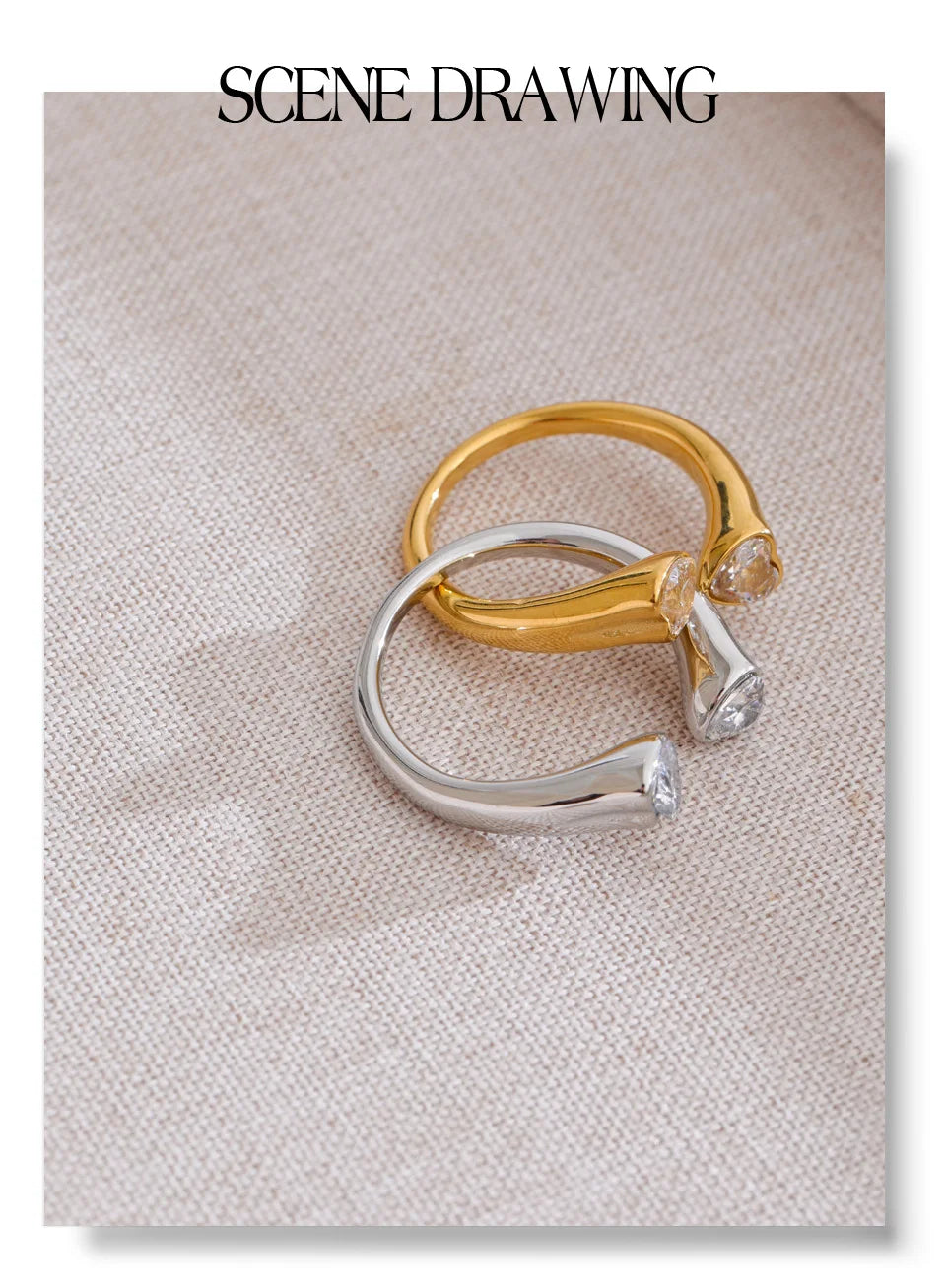 Cubic zirconia heart ring in 18K gold-plated stainless steel with cubic zirconia.