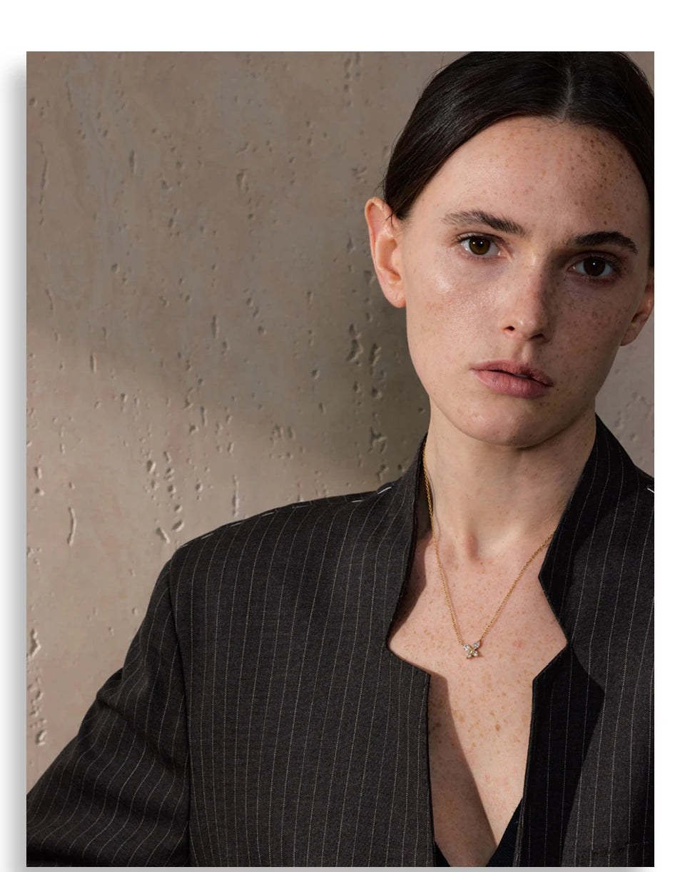Cubic zirconia butterfly necklace in gold-plated stainless steel with cubic zirconia.