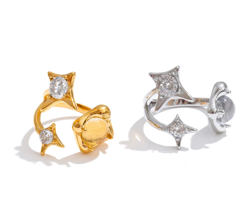Cubic zirconia geometric ring in 18K gold-plated stainless steel with cubic zirconia.