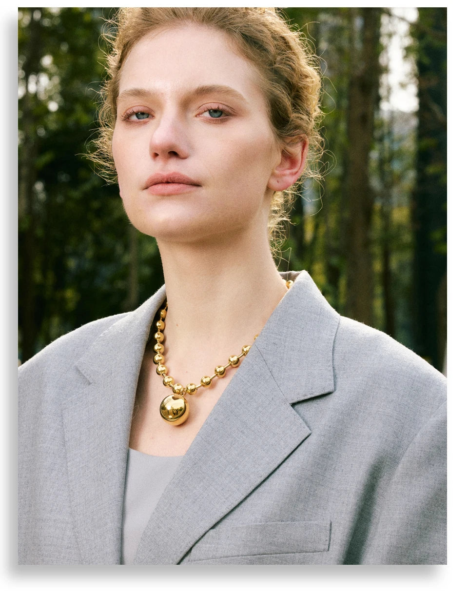 Heart star beaded necklace in gold-plated stainless steel.