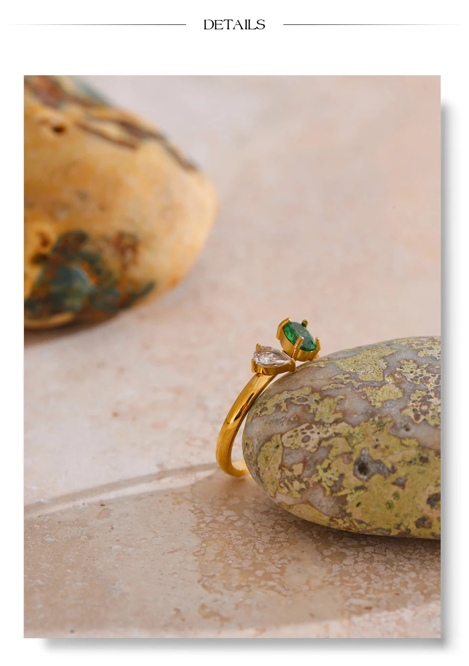Cubic zirconia geometric ring in 18K gold-plated stainless steel with cubic zirconia.