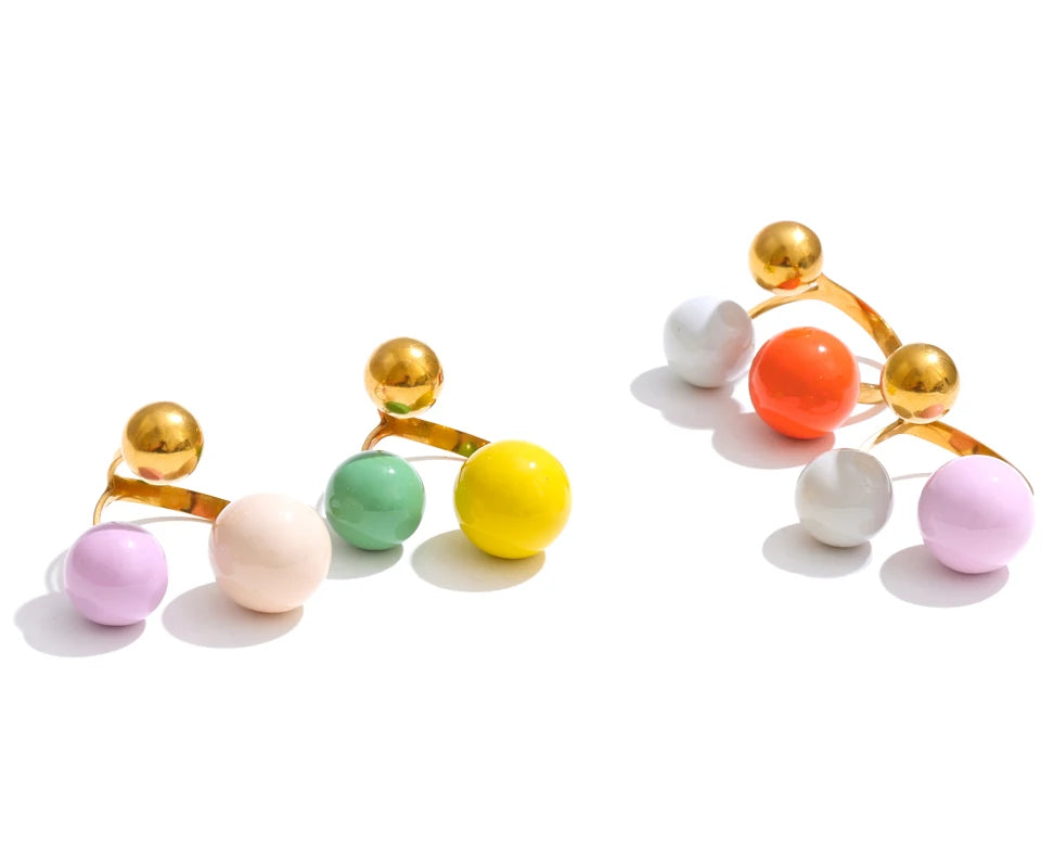Enamel multi-color geometric ring in 18K gold-plated stainless steel with enamel.
