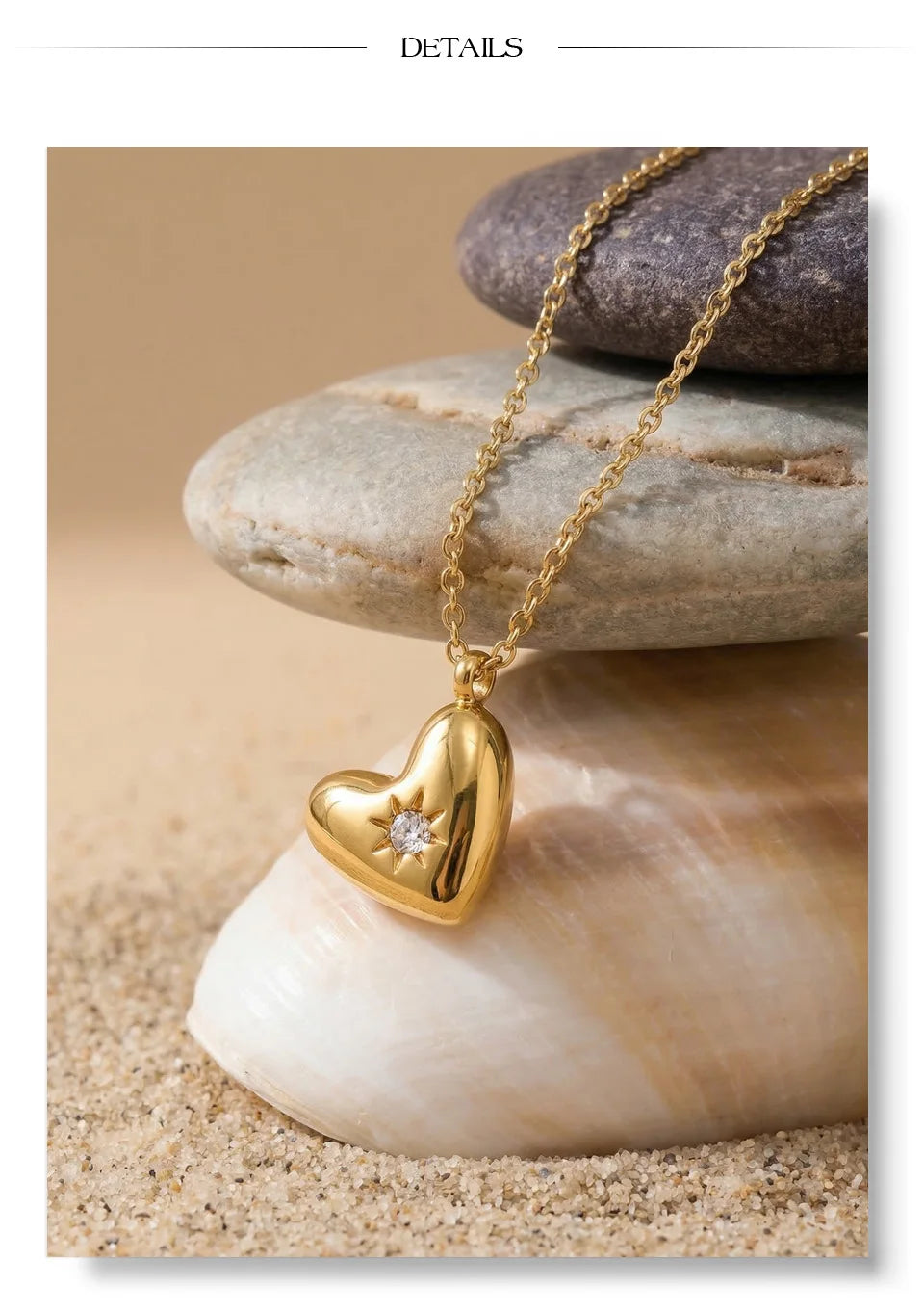 Cubic zirconia heart necklace in gold-plated stainless steel with cubic zirconia.