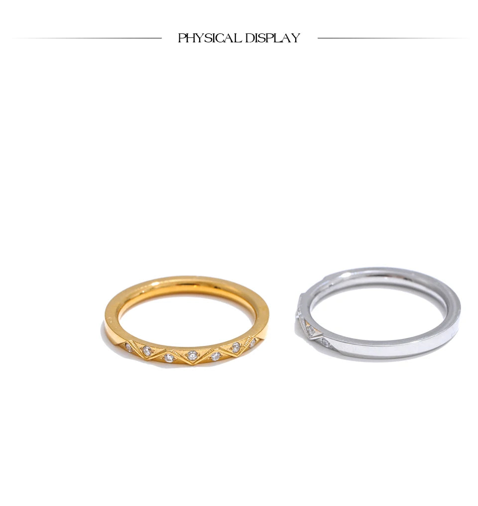 Cubic zirconia geometric ring in gold-plated stainless steel with cubic zirconia.