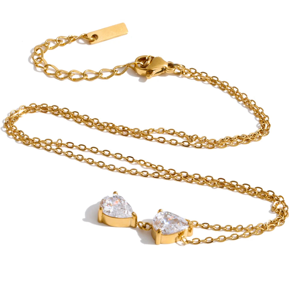 Cubic zirconia geometric necklace in gold-plated stainless steel with cubic zirconia.