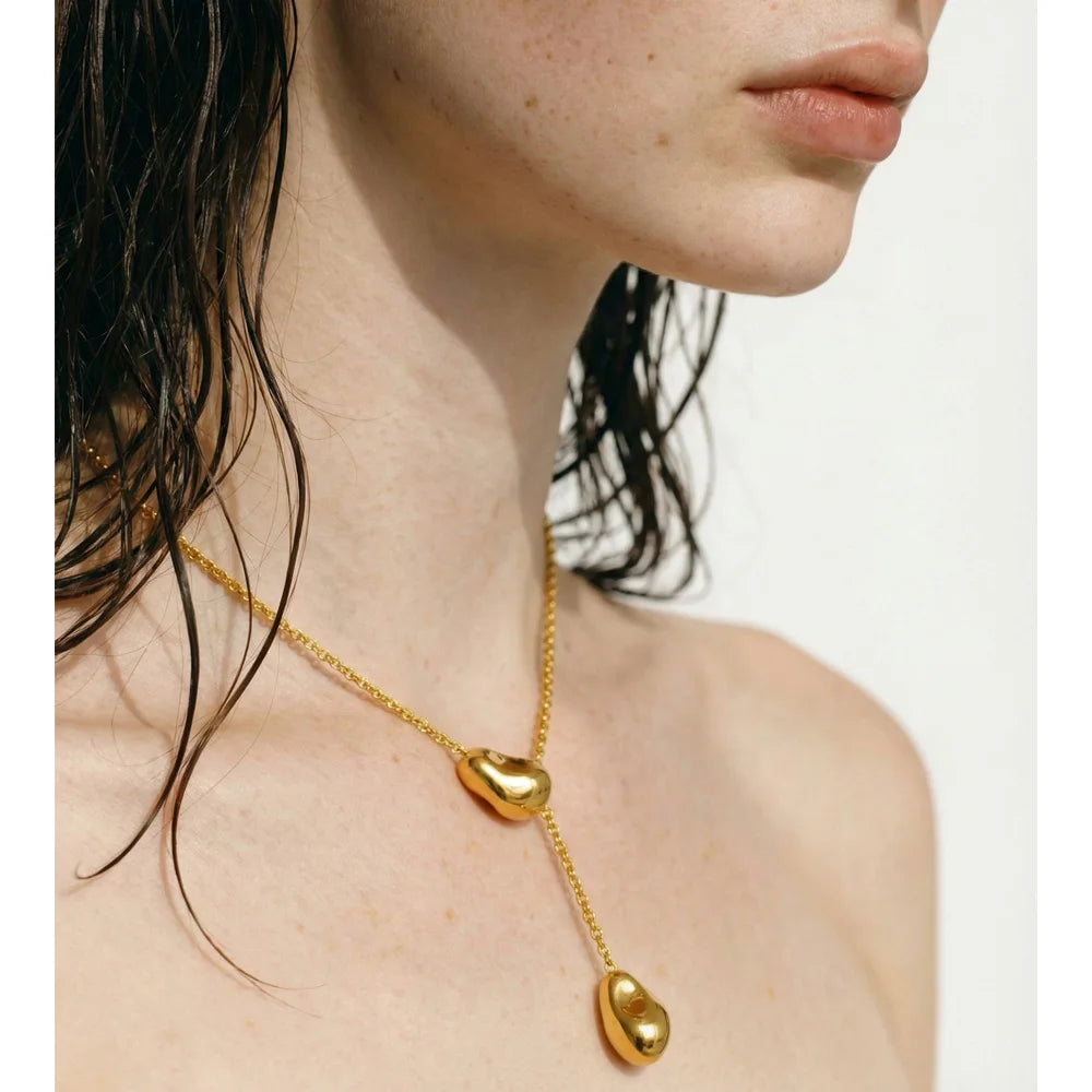 Geometric necklace in gold-plated stainless steel.