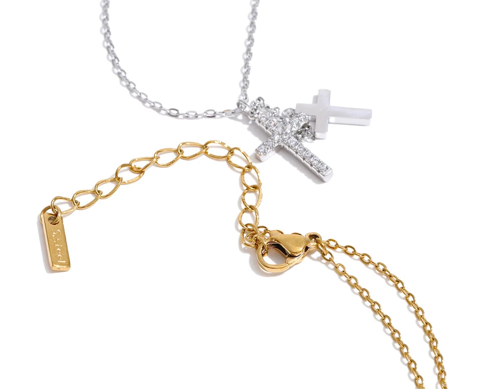 Cubic zirconia cross chain necklace in gold-plated stainless steel with cubic zirconia.