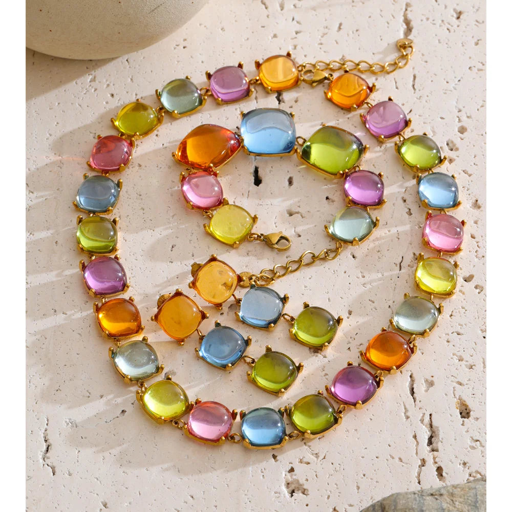 Resin acrylic multi-color earrings in gold-plated stainless steel with resin and acrylic.