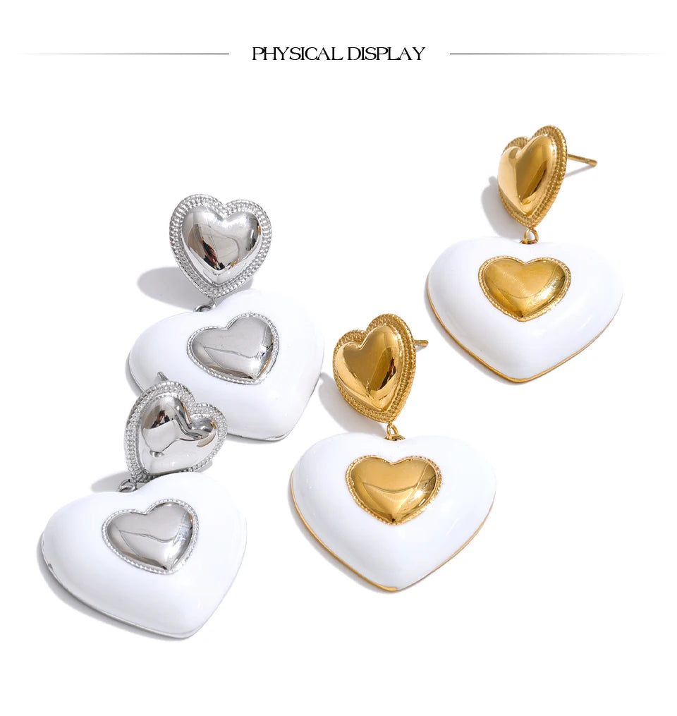 White enamel heart earrings in gold-plated stainless steel with enamel.