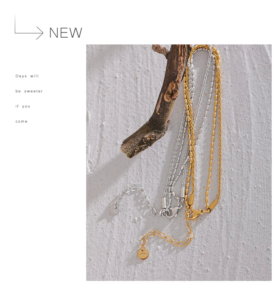 Geometric chain layered necklace in gold-plated stainless steel.