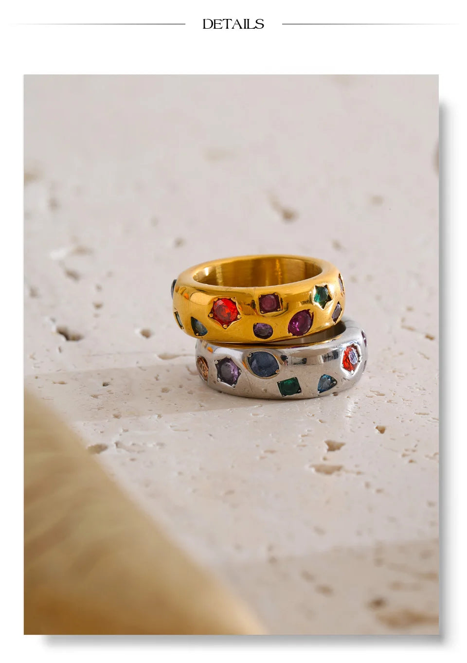 Cubic zirconia multi-color geometric ring in 18K gold-plated stainless steel with cubic zirconia.